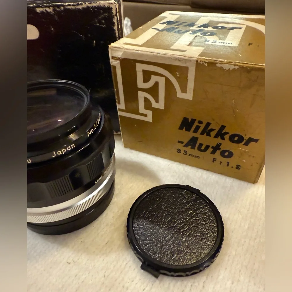 Classic Nikon 85mm F1.8 Non AI Nikkor aka “The portrait lens” w/leather case